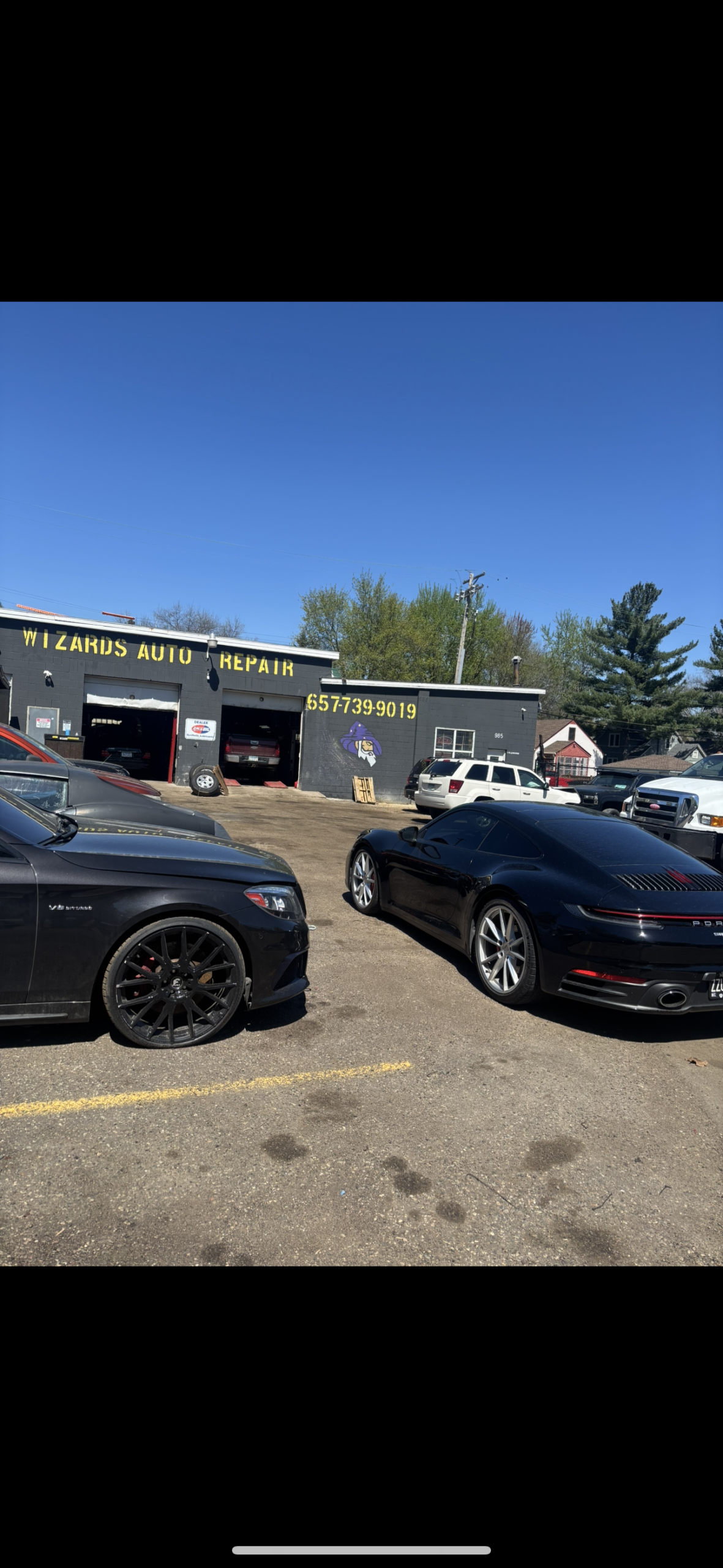 Wizards Auto Repair shop with Porsche and Mercedes